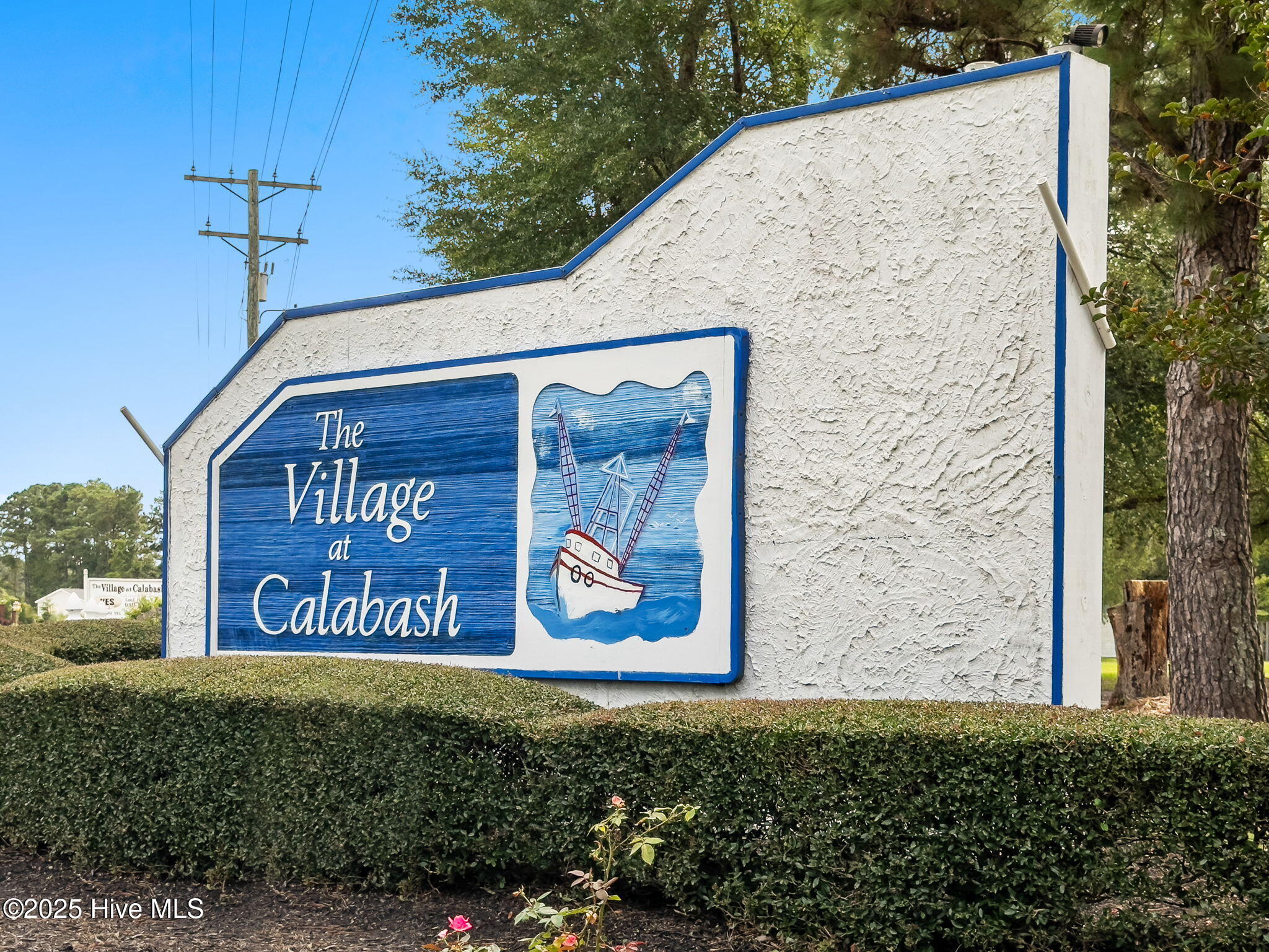 818 Watson Avenue Southwest Calabash, NC 28467 - Photo 44 of 45 village sign
