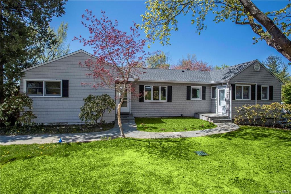 Welcome to this four Bedroom, three Bath Expanded Ranch in Ossining.