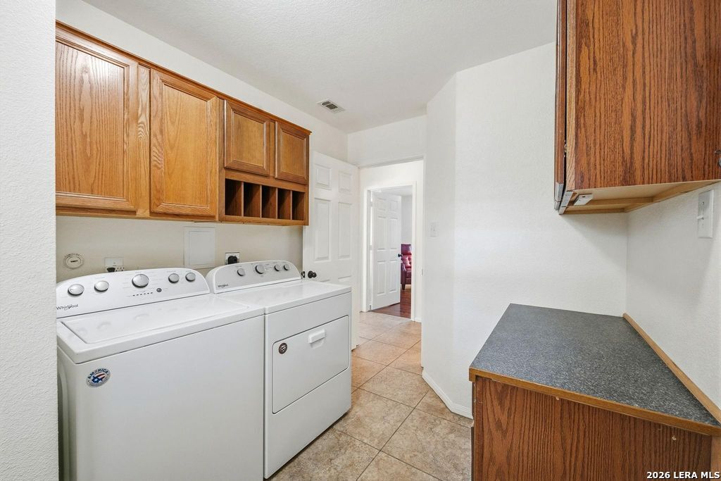 318 River Ridge Boerne, TX 78006 - Photo 33 of 46 a utility room with dryer and washer