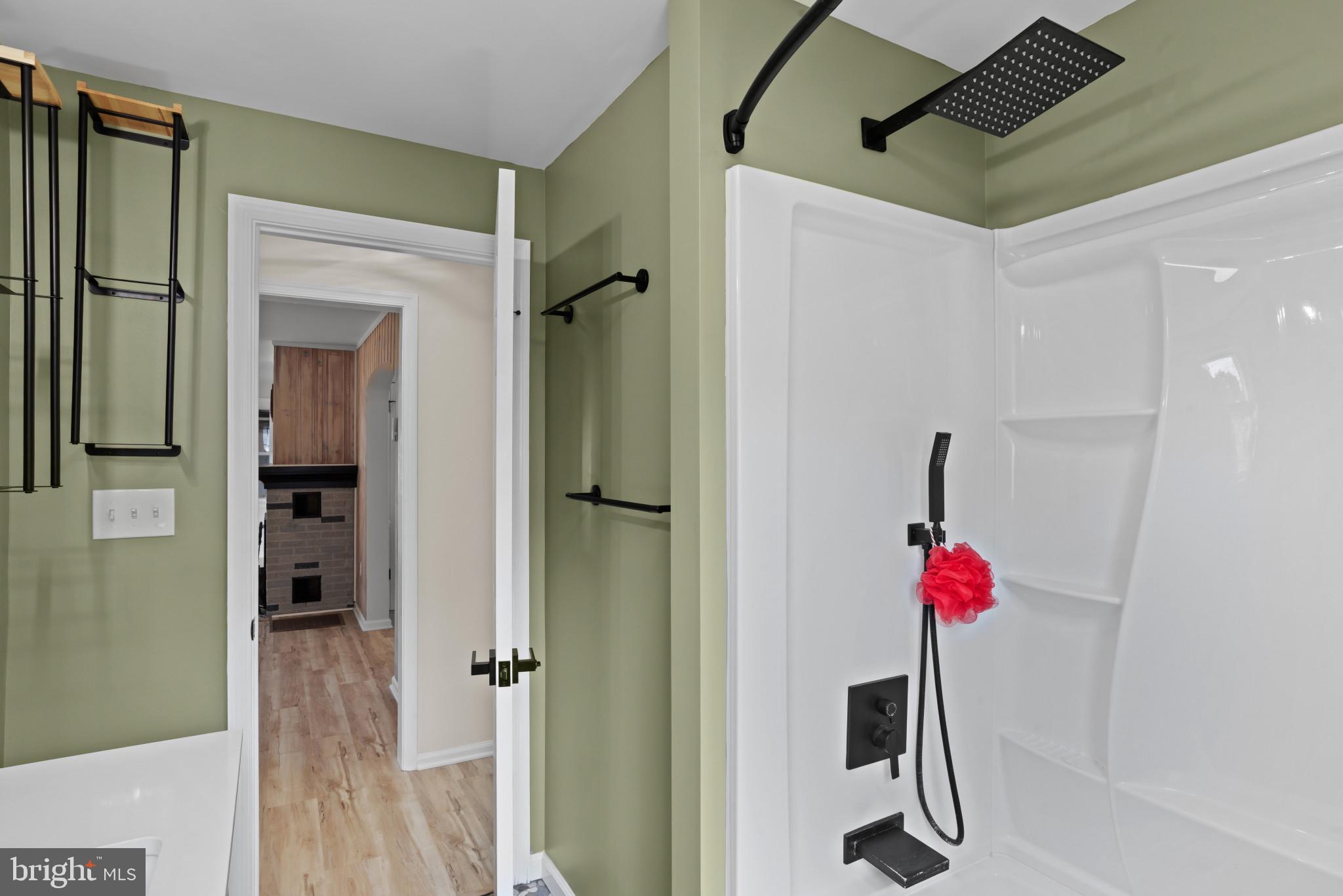 14 Sharon Road Enola, PA 17025 - Photo 18 of 40 Shower enclosure featuring a matte black rainfall