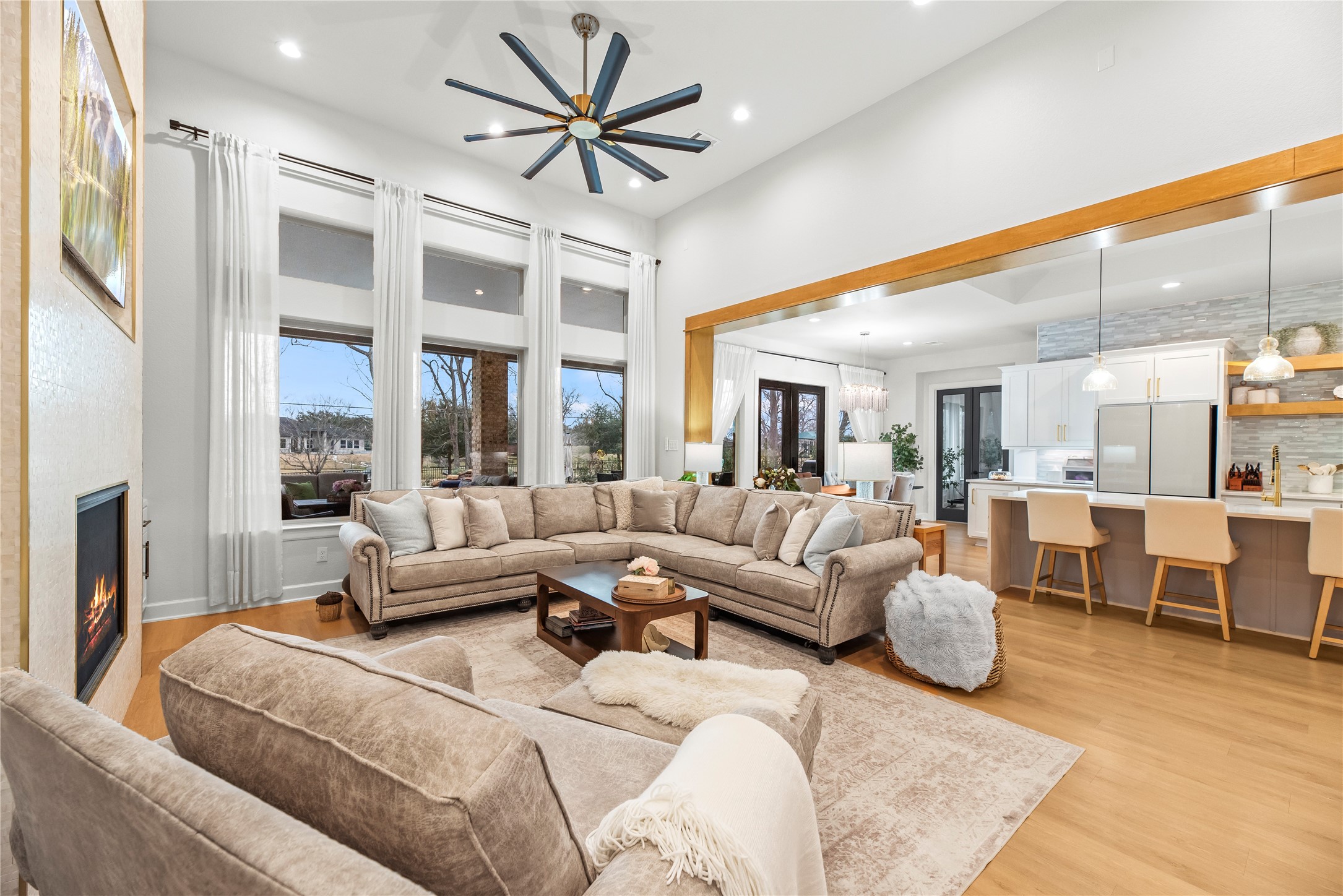 4218 Wooded Isle Way Fulshear, TX 77441 - Photo 50 of 50 a living room with furniture wooden floor and a large window