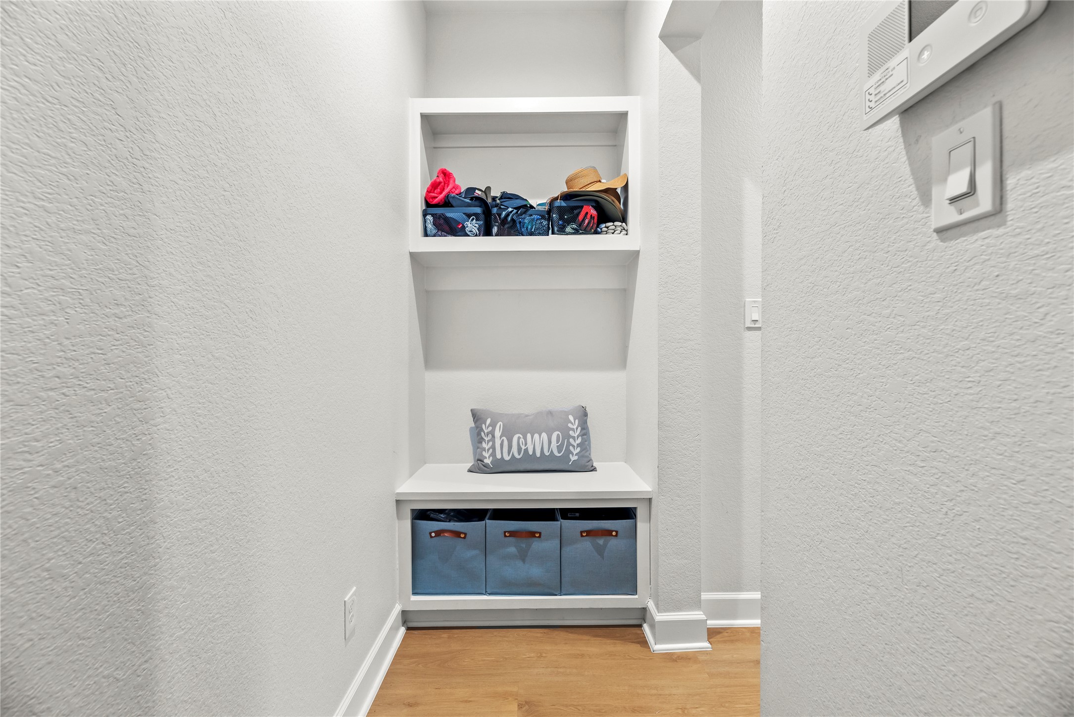 4218 Wooded Isle Way Fulshear, TX 77441 - Photo 21 of 50 a view of an front door and cabinet with hallway