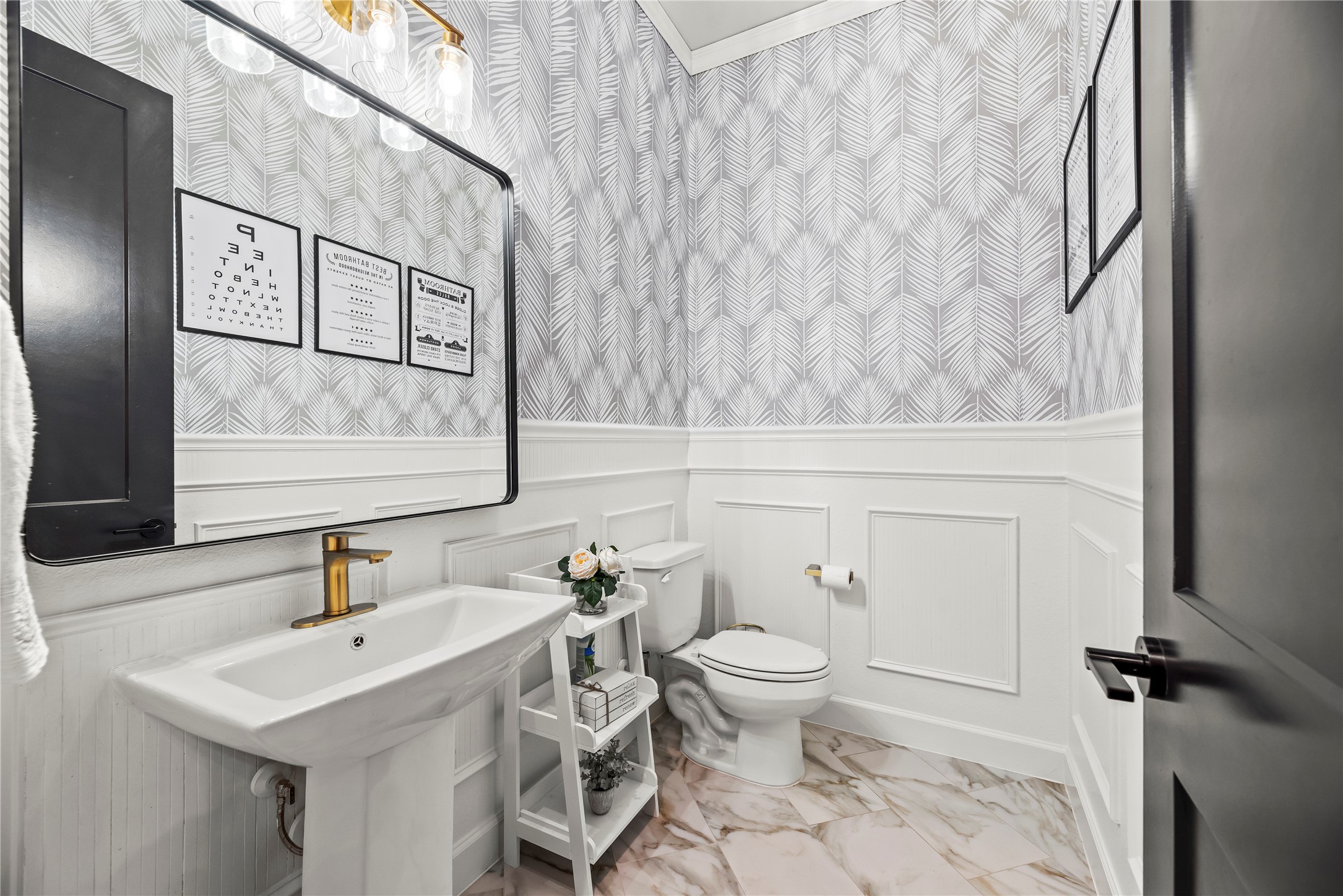 4218 Wooded Isle Way Fulshear, TX 77441 - Photo 30 of 50 a bathroom with a sink toilet and mirror