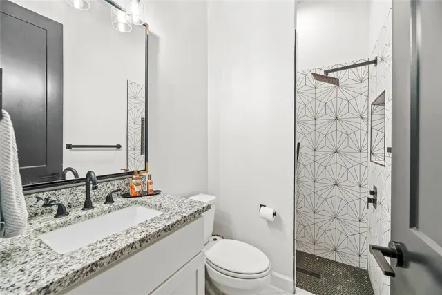 a bed room with a bed and a painting