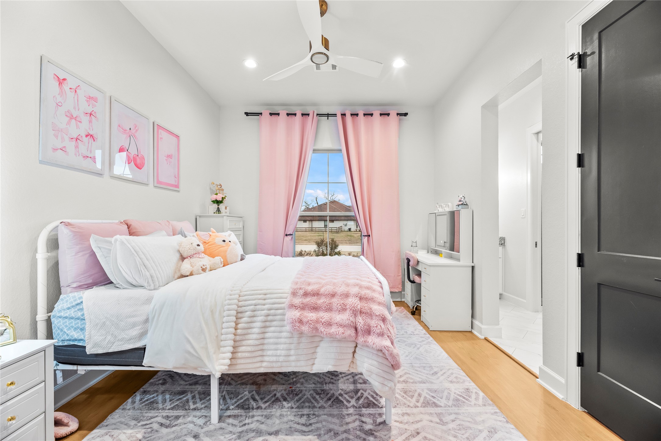 4218 Wooded Isle Way Fulshear, TX 77441 - Photo 33 of 50 a bed room with a bed and a painting