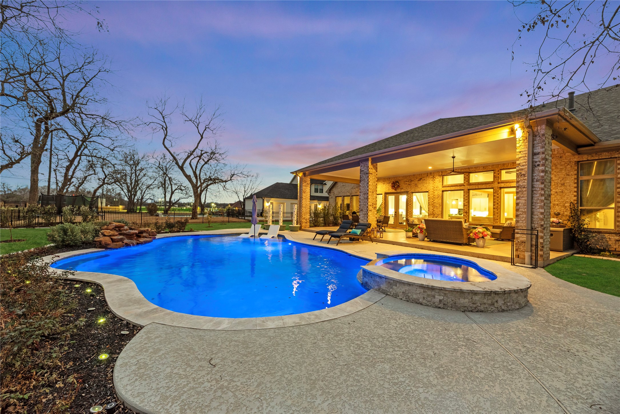 4218 Wooded Isle Way Fulshear, TX 77441 - Photo 39 of 50 a view of swimming pool with outdoor seating