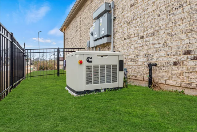 an aerial view of a house with outdoor space
