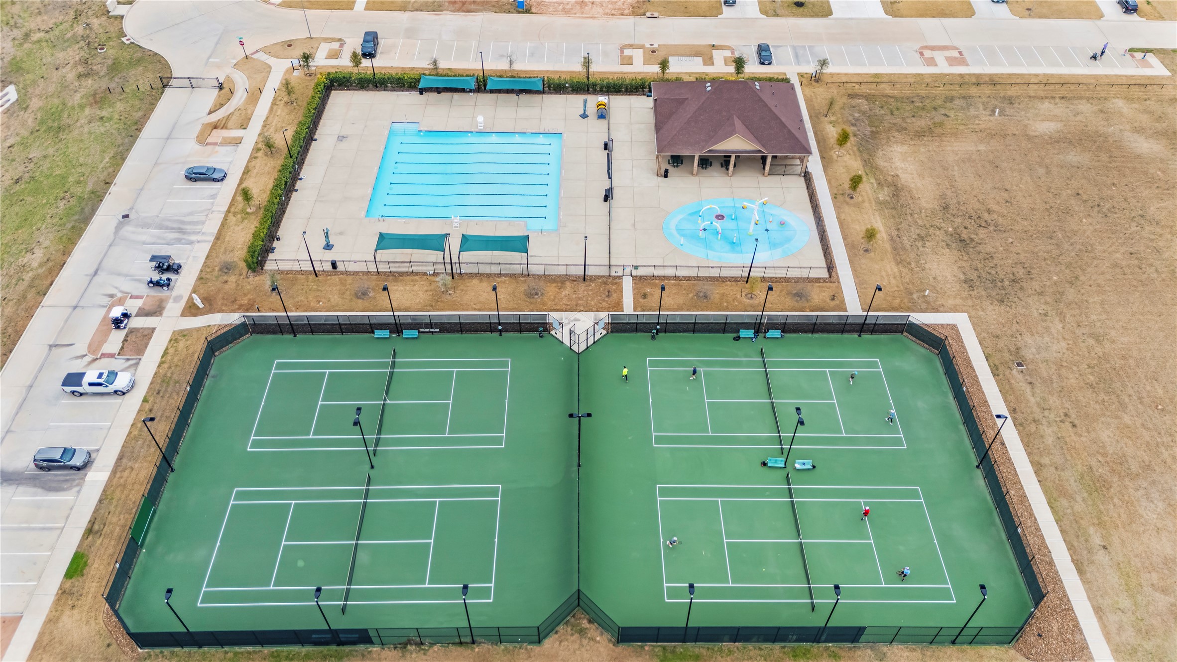 4218 Wooded Isle Way Fulshear, TX 77441 - Photo 46 of 50 an aerial view of a house