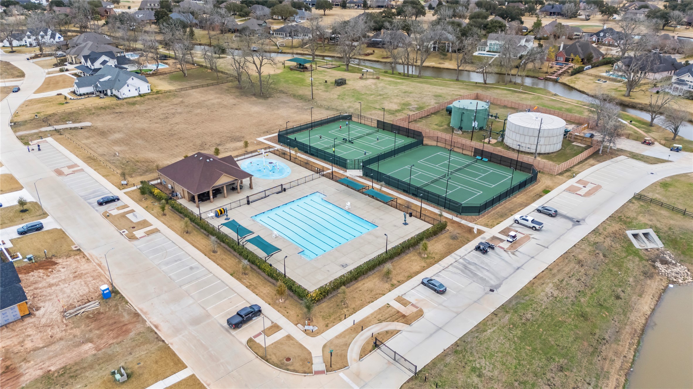 4218 Wooded Isle Way Fulshear, TX 77441 - Photo 47 of 50 an aerial view of a house with a ocean view