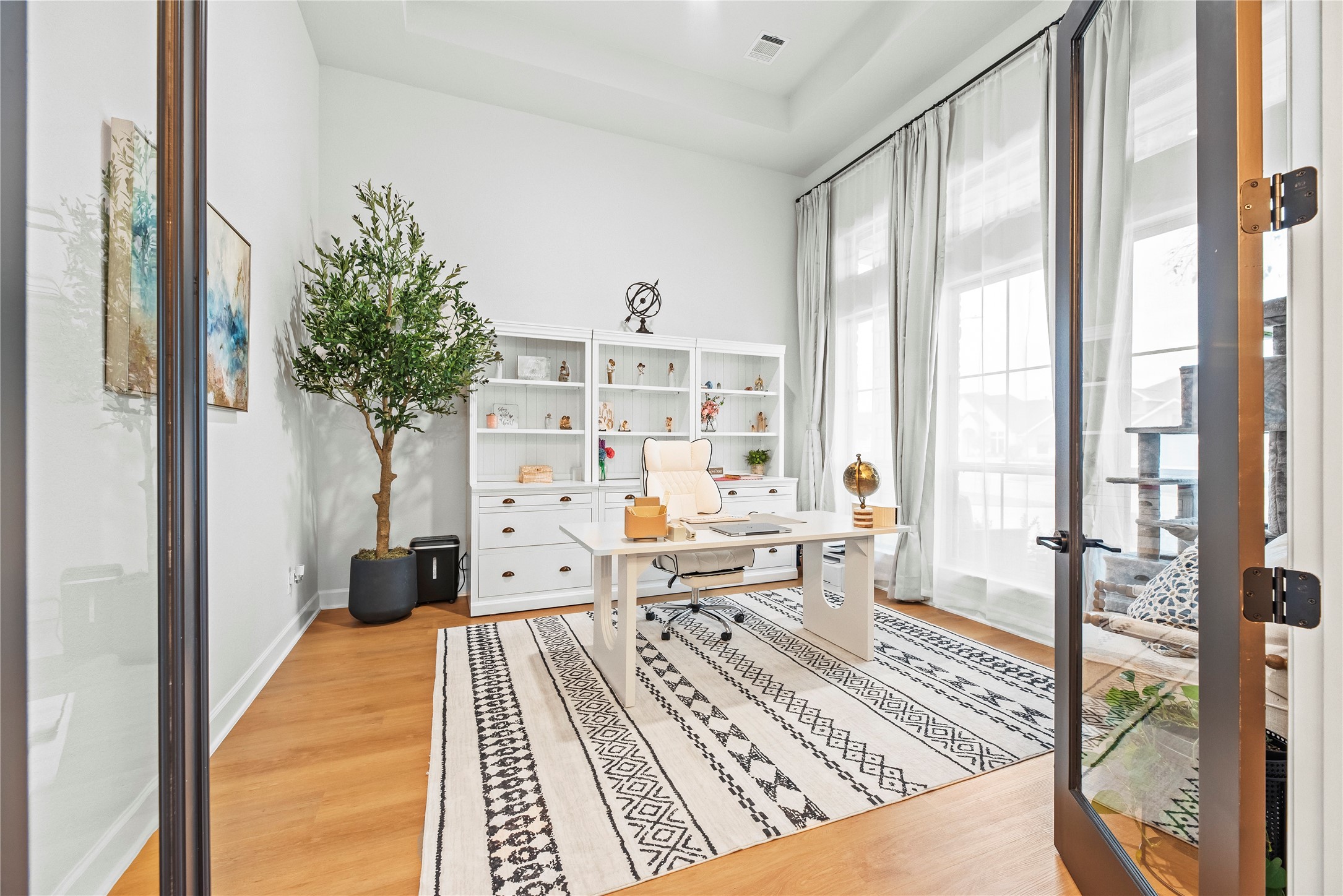 4218 Wooded Isle Way Fulshear, TX 77441 - Photo 10 of 50 a living room with furniture and a large window