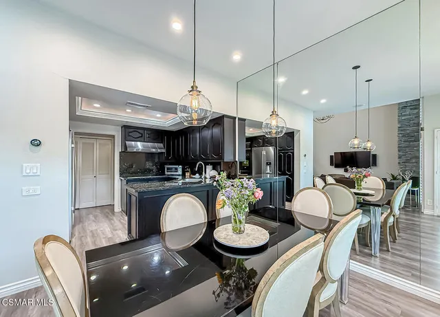 a view of a dining room with furniture