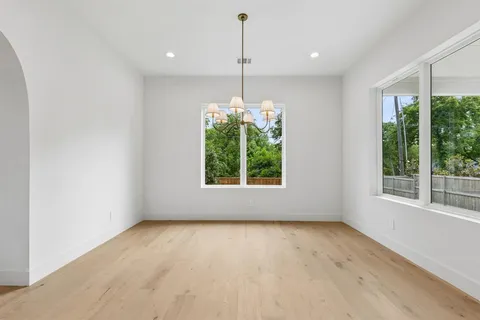 a view of a room with windows