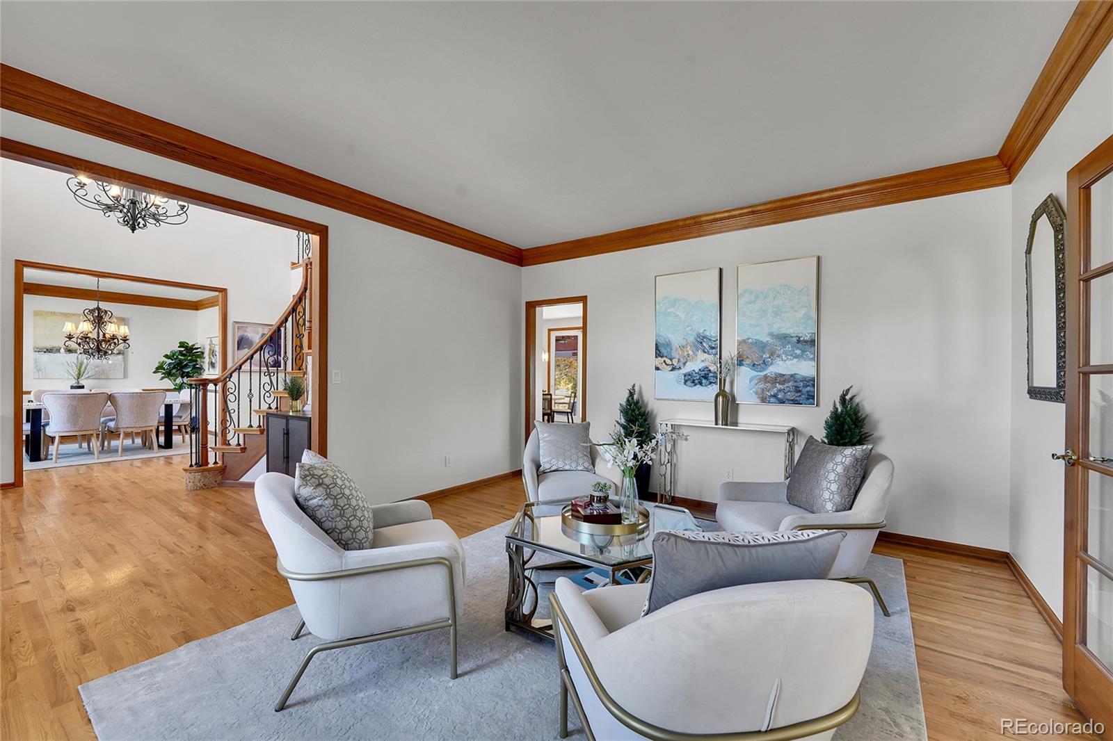 2226 Thistle Ridge Circle Highlands Ranch, CO 80126 - Photo 18 of 49 a living room with furniture and a large window