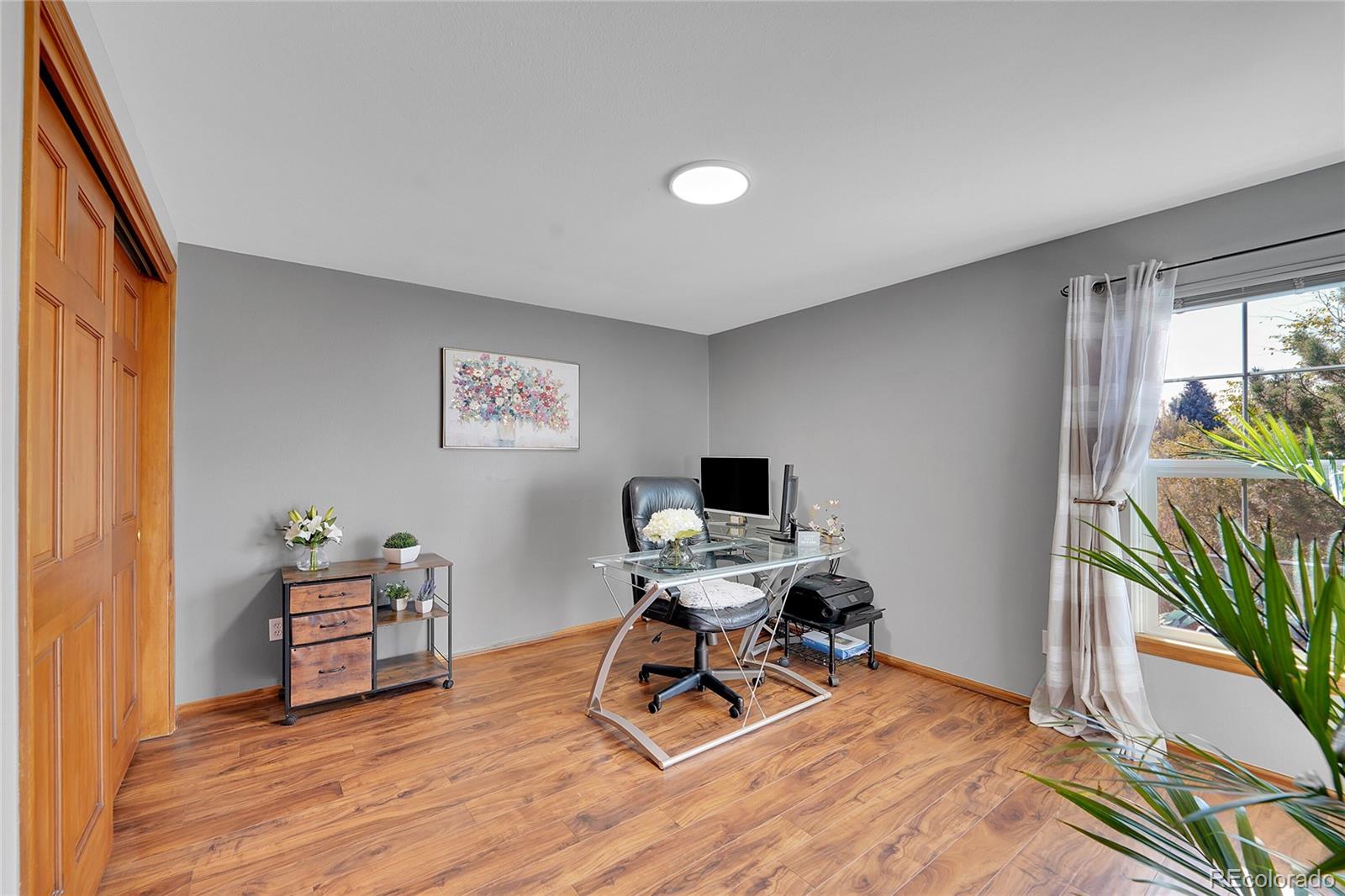 2226 Thistle Ridge Circle Highlands Ranch, CO 80126 - Photo 26 of 49 a workspace with furniture and a window