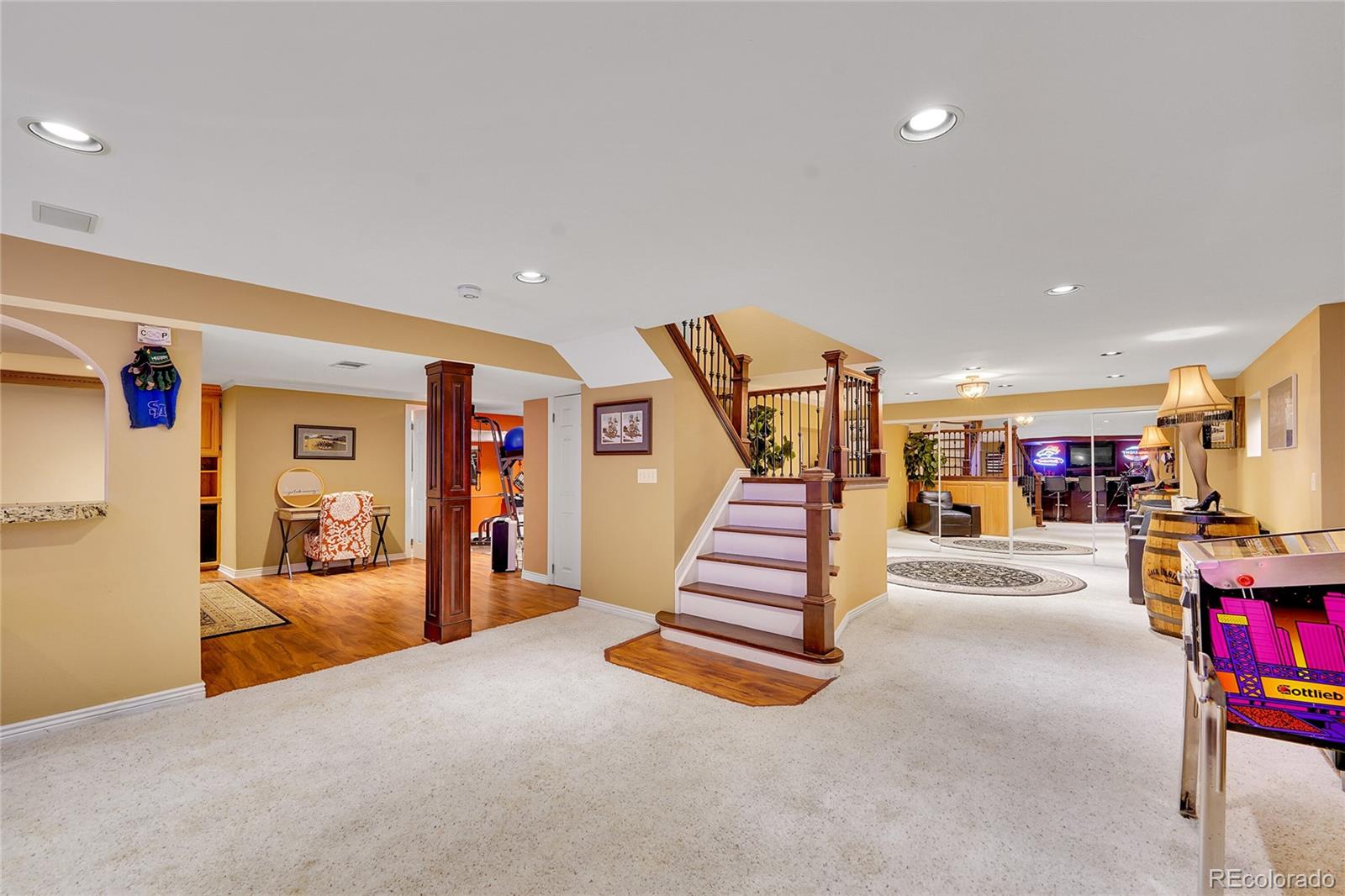 2226 Thistle Ridge Circle Highlands Ranch, CO 80126 - Photo 30 of 49 a living room with furniture and a flat screen tv