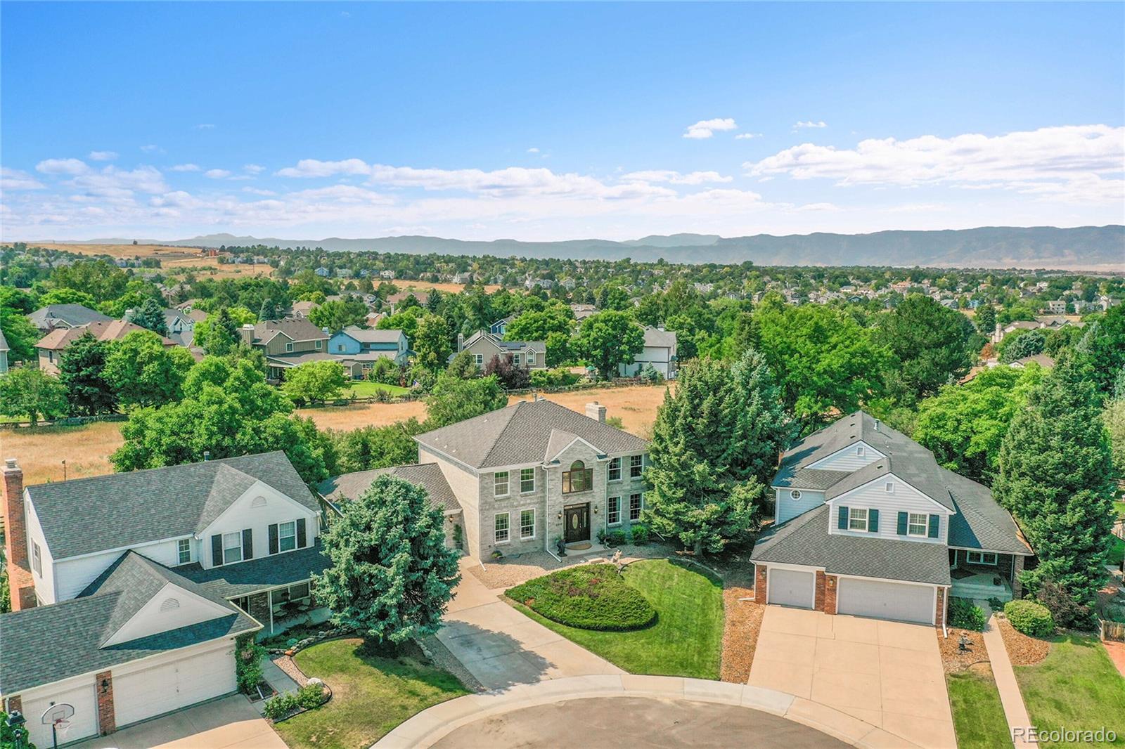 2226 Thistle Ridge Circle Highlands Ranch, CO 80126 - Photo 3 of 49 a view of a city from a terrace