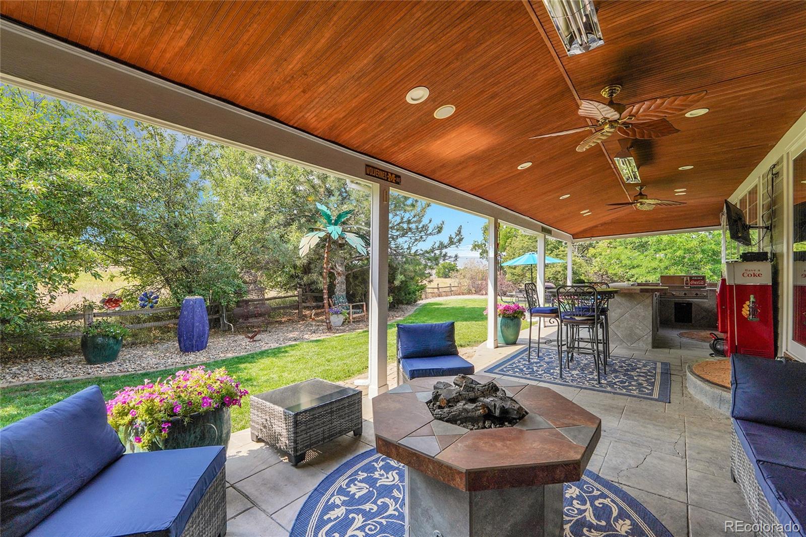 2226 Thistle Ridge Circle Highlands Ranch, CO 80126 - Photo 40 of 49 a outdoor space with furniture and garden view