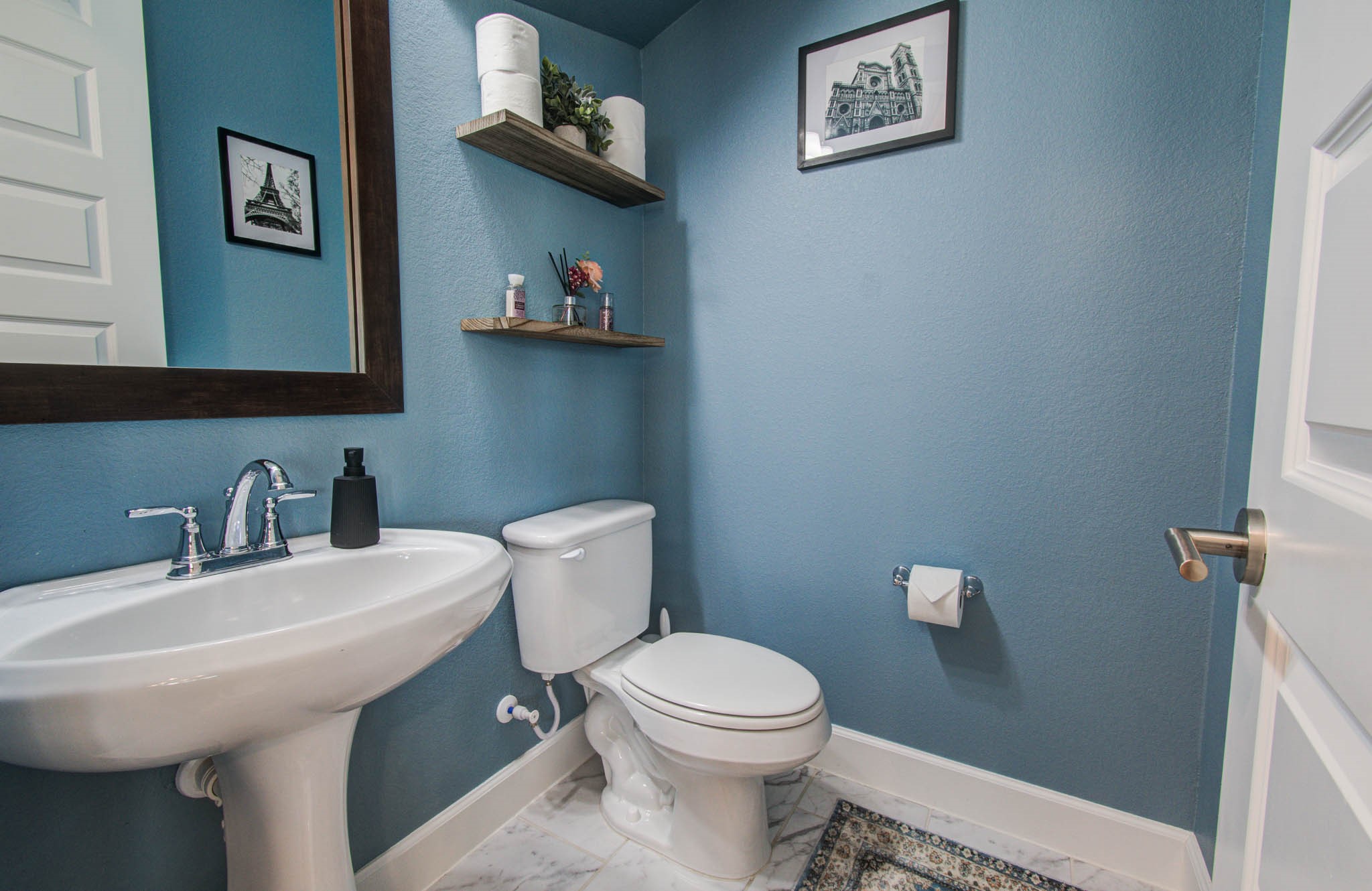 24430 Switchgrass Vly Way Katy, TX 77493 - Photo 22 of 50 Powder bathroom. Floating shelves.
