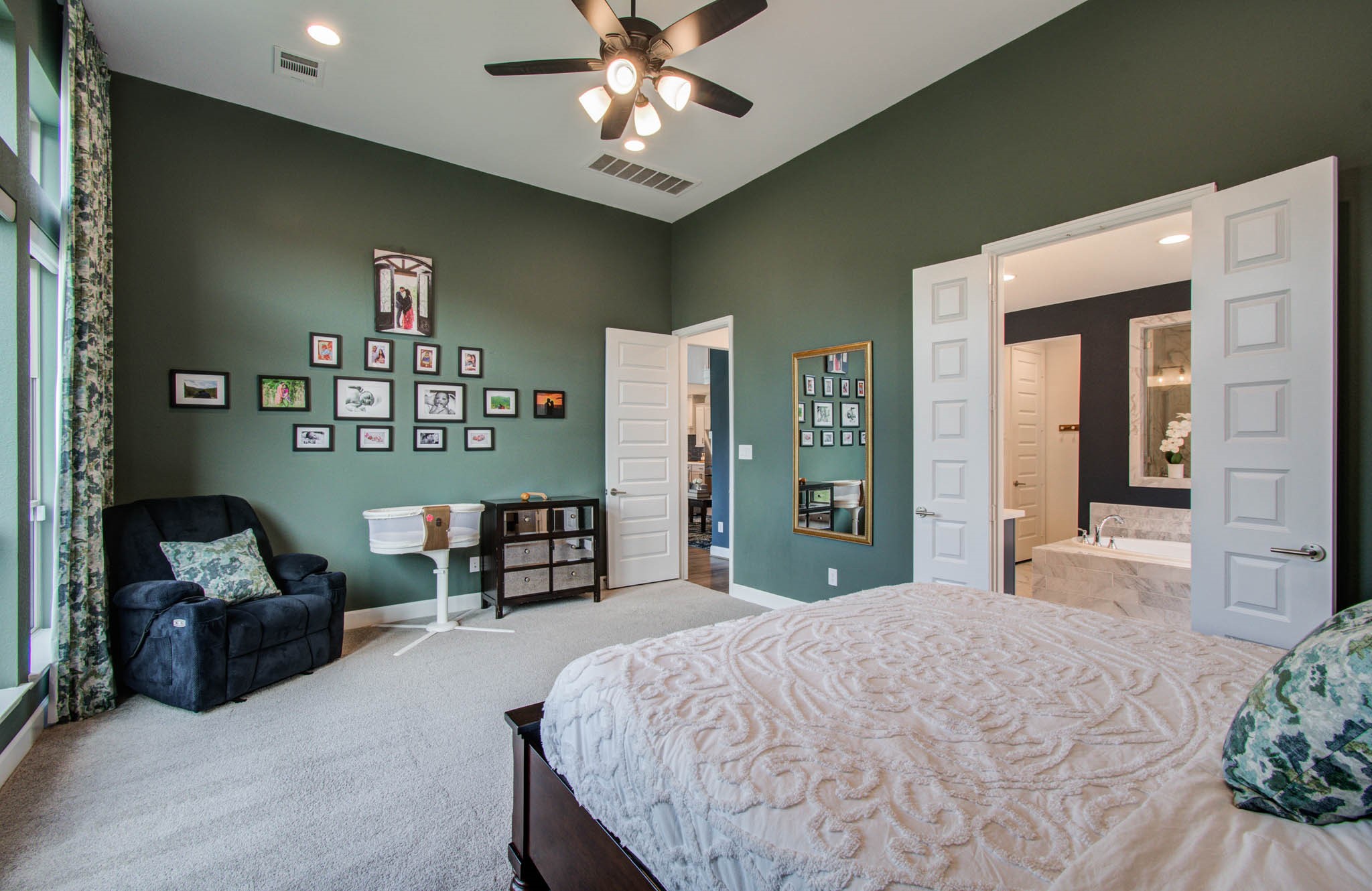 24430 Switchgrass Vly Way Katy, TX 77493 - Photo 28 of 50 The room connects to a modern bathroom with double doors, adding a luxurious touch.