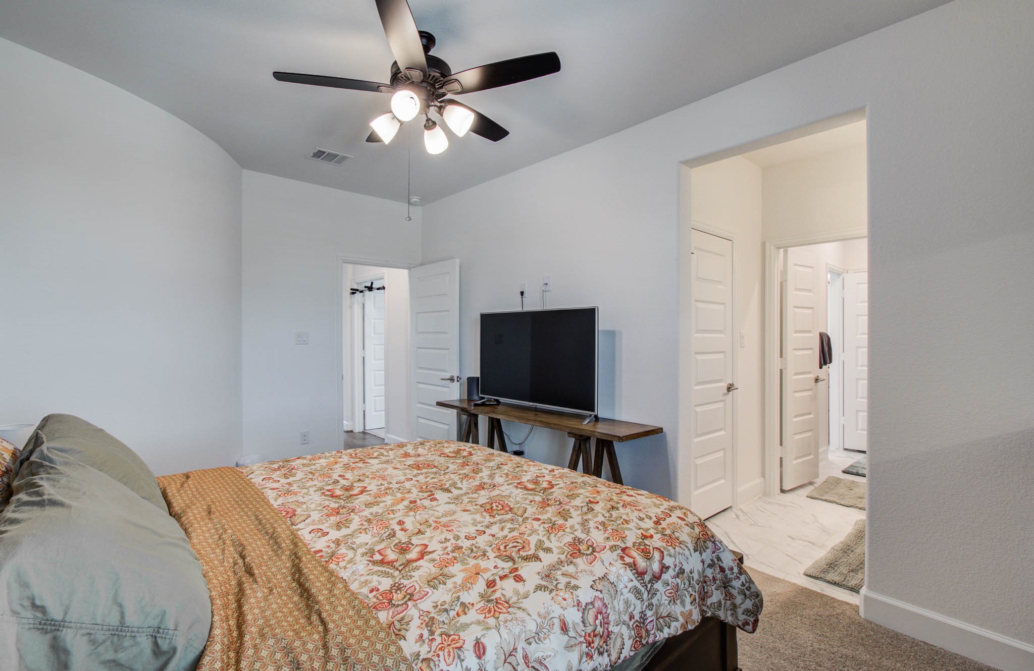 24430 Switchgrass Vly Way Katy, TX 77493 - Photo 38 of 50 Secondary bedroom up with ceiling fan and roller shades. This room has it own bath.