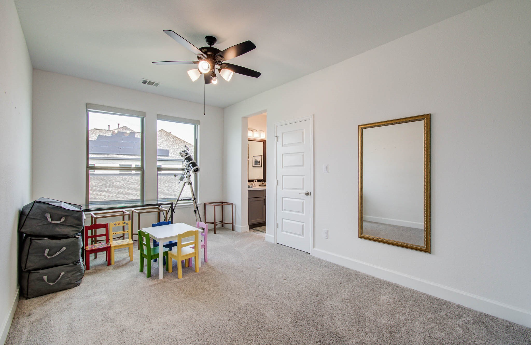24430 Switchgrass Vly Way Katy, TX 77493 - Photo 40 of 50 secondary bedroom with roller shades, ceiling fan and jack and jill bath.