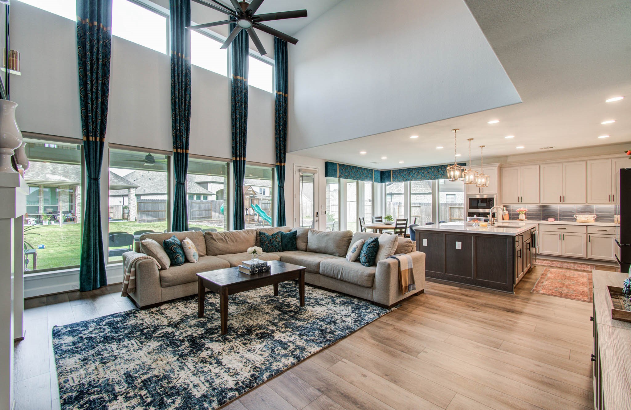 24430 Switchgrass Vly Way Katy, TX 77493 - Photo 9 of 50 Luxury vinyl wide planks throughout home. Electric roller shades.