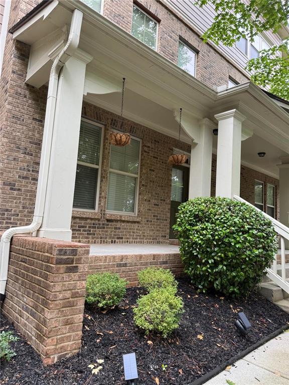 4358 Grove Field Court Northwest Suwanee, GA 30024 - Photo 15 of 17 a view of a house with a yard
