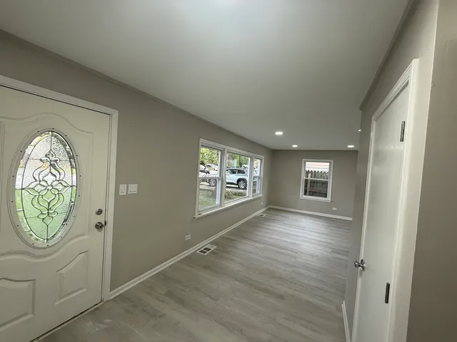 an empty room with windows