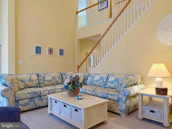 a view of livingroom with furniture and a couch