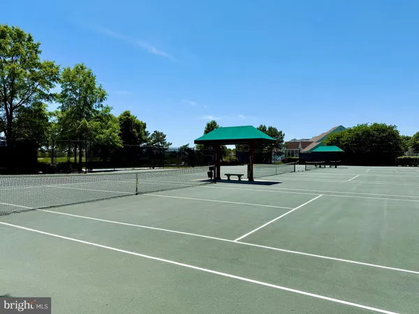 a view of swimming pool with a yard