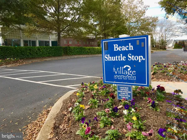 a view of a patio with swimming pool and furniture