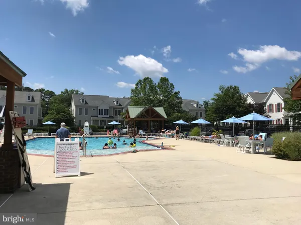 a view of a table and chairs in the river