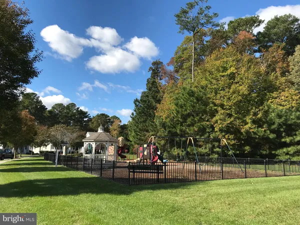 a view of car parked in front of house