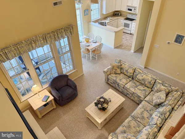 a living room with furniture and a couch