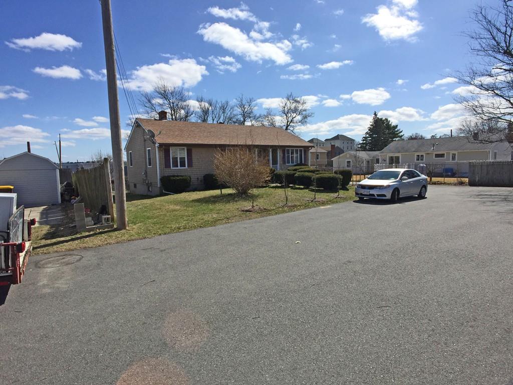 28 Dundee Street Fall River, MA 02721 - Photo 28 of 28 a car parked in front of a house