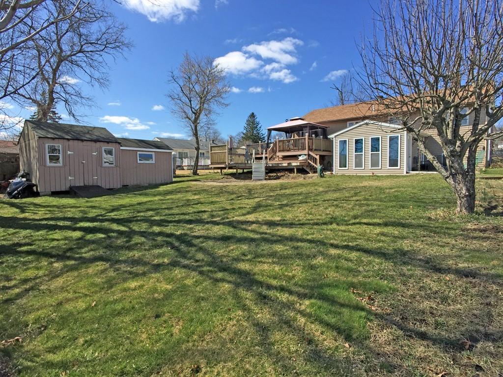 28 Dundee Street Fall River, MA 02721 - Photo 4 of 28 a front view of a house with a yard
