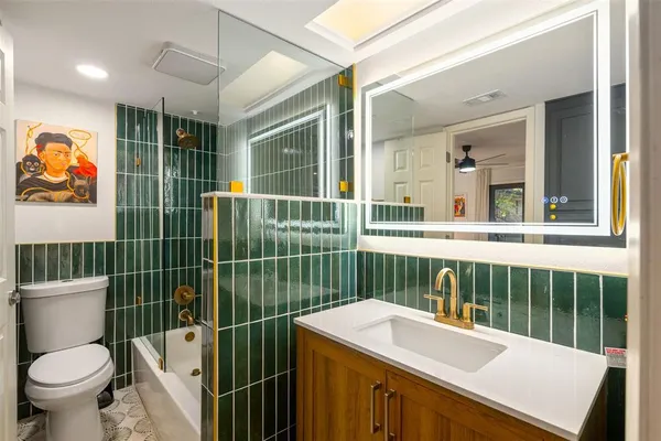 a view of a bathroom with a sink and a toilet