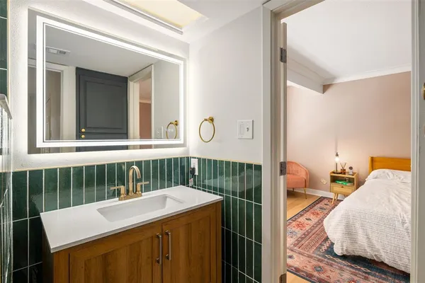 a view of a bedroom from a furniture