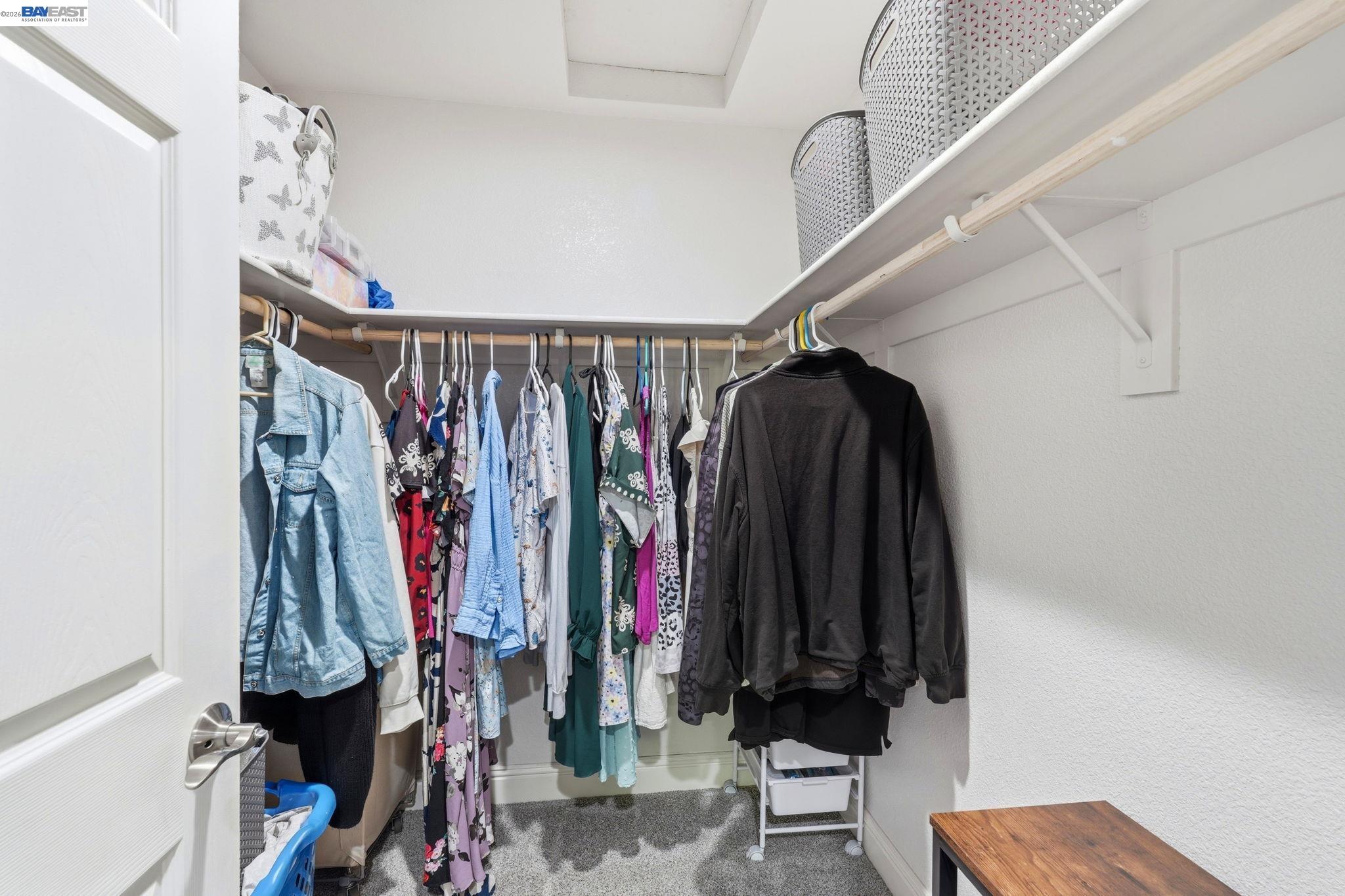 10378 South Priest Road French Camp, CA 95231 - Photo 29 of 44 a view of walk in closet with clothes