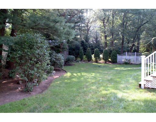 153 Meadowbrook Road Needham, MA 02492 - Photo 7 of 9 a view of a backyard with a garden