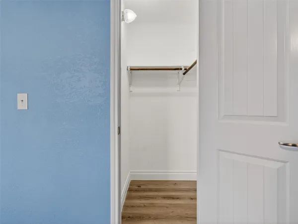 a view of small space with wooden floor