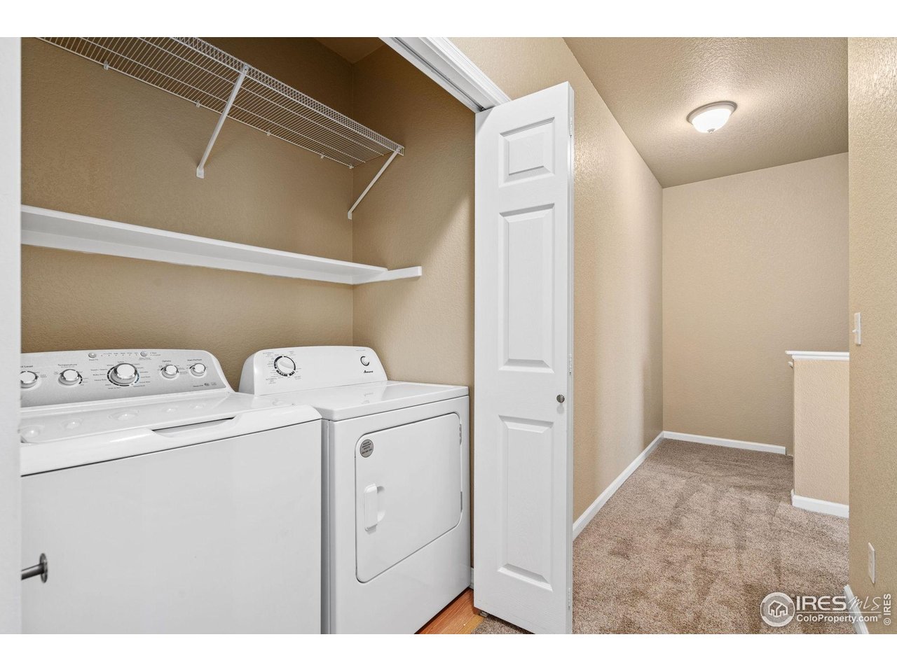 6925 19th Street, Unit 15 Greeley, CO 80634 - Photo 23 of 32 a utility room with dryer and washer
