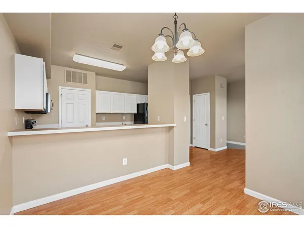 a view of kitchen with granite countertop cabinets a sink and dishwasher