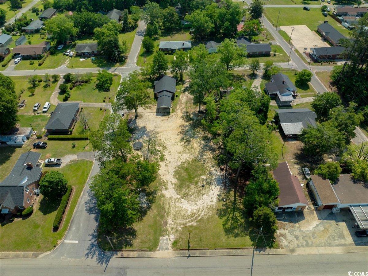 Aerial view of property and surrounding area featu