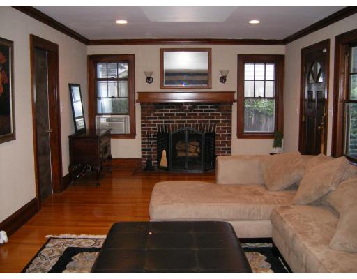 9 Hillside Road Newton, MA 02461 - Photo 5 of 9 a living room with furniture and a fireplace