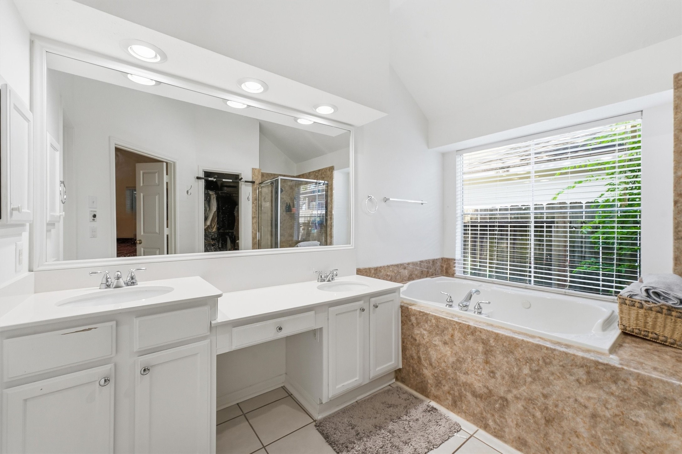 18811 Racquet Sports Way Humble, TX 77346 - Photo 23 of 28 Primary bathroom with dual sinks.