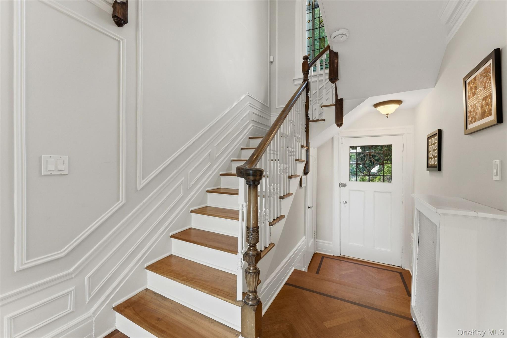 2 Dellwood Road Bronxville, NY 10708 - Photo 21 of 46 Main Staircase providing access to the second level and also access to the gardens.