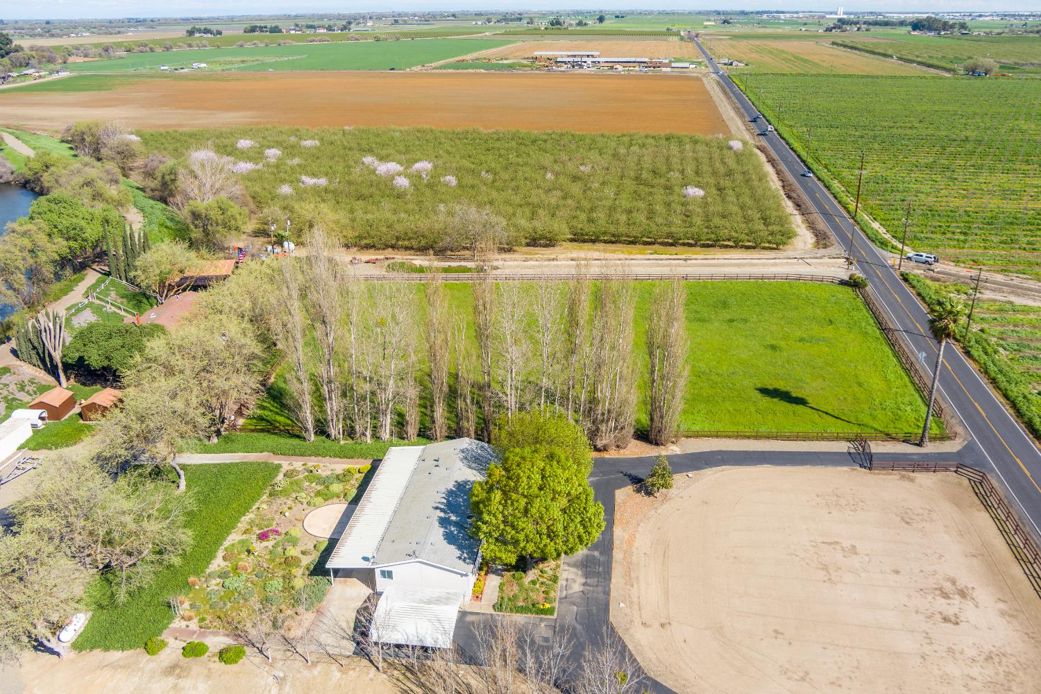 14101 Bethany Road Tracy, CA 95304 - Photo 11 of 68 a view of swimming pool with a yard and outdoor seating