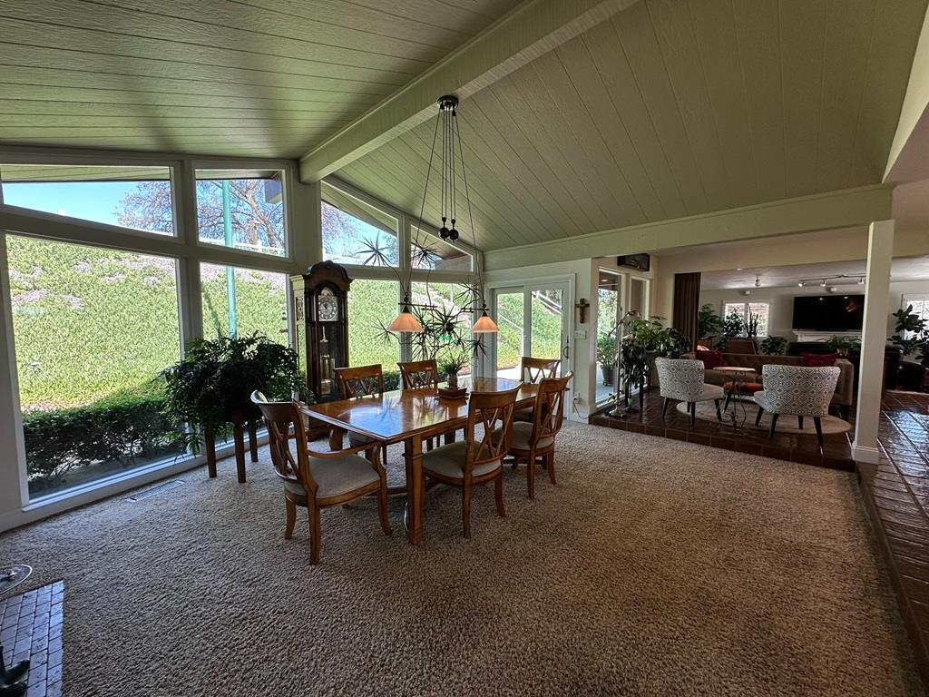 14101 Bethany Road Tracy, CA 95304 - Photo 15 of 68 a view of a dining room with furniture window and outside view