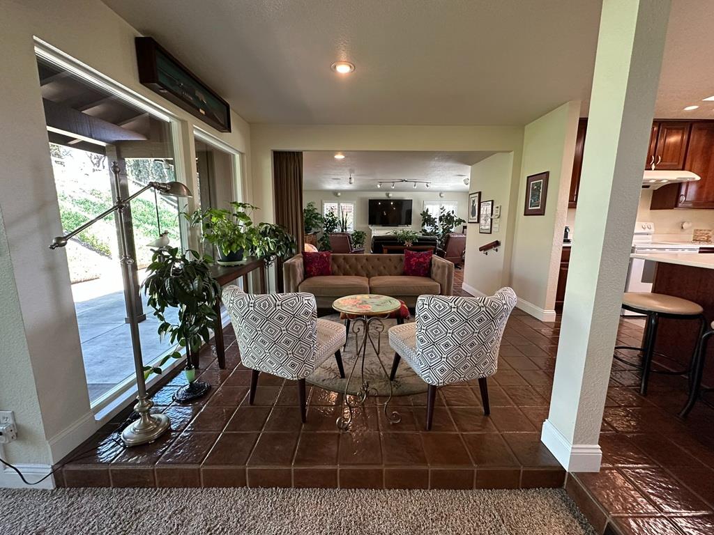 14101 Bethany Road Tracy, CA 95304 - Photo 32 of 68 a view of a dining room with furniture window and wooden floor